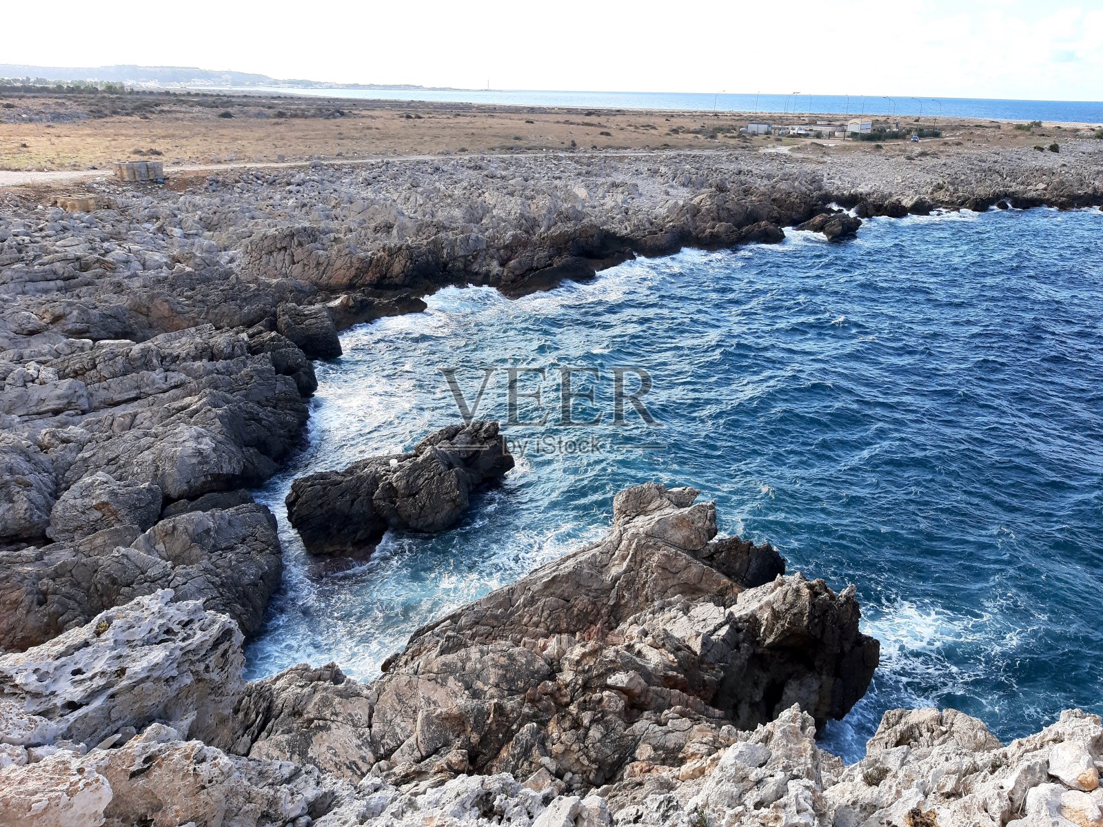 背景是意大利西西里岛的海岬海岸照片摄影图片