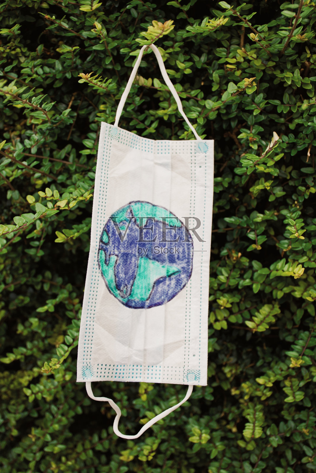 不可持续的面具与行星地球绘图照片摄影图片