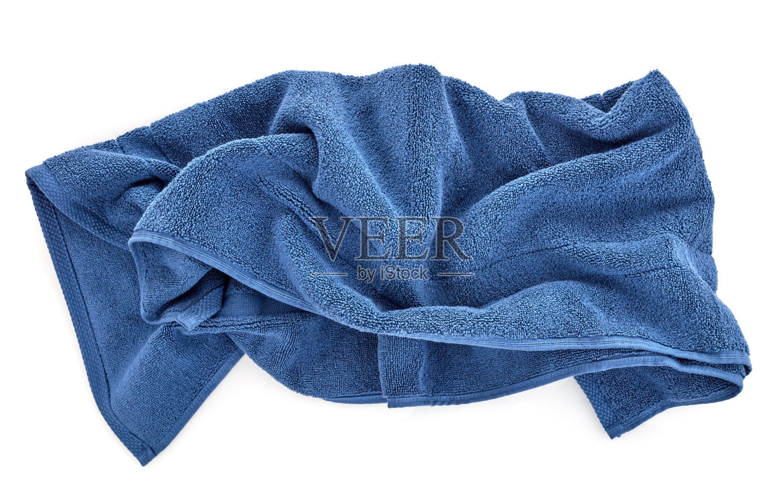 蓝色毛巾在白色的背景照片摄影图片