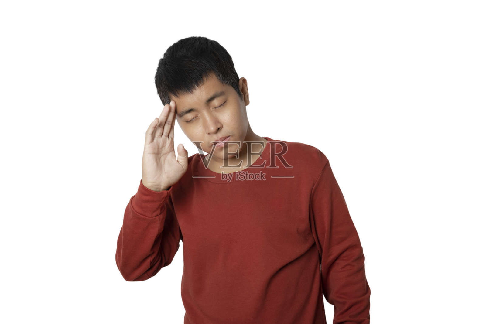 年轻男人做出头痛的姿势,生病了照片摄影图片