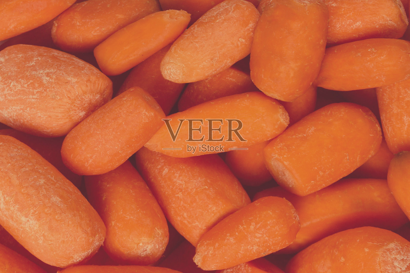 用新鲜的胡萝卜做背景。零食。照片摄影图片