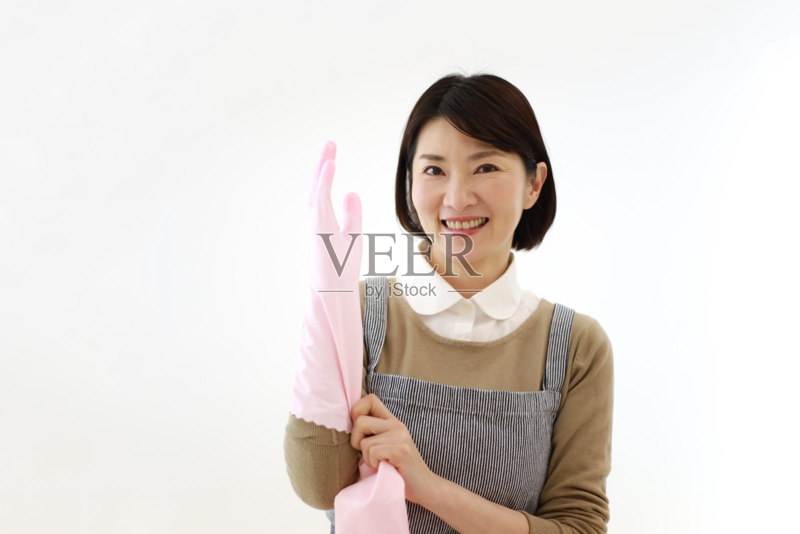 戴橡胶手套的女人照片摄影图片