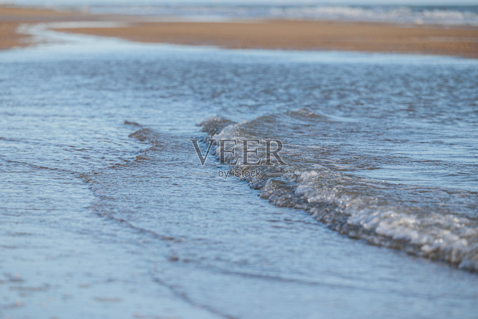 平静的低潮在海边移动照片摄影图片