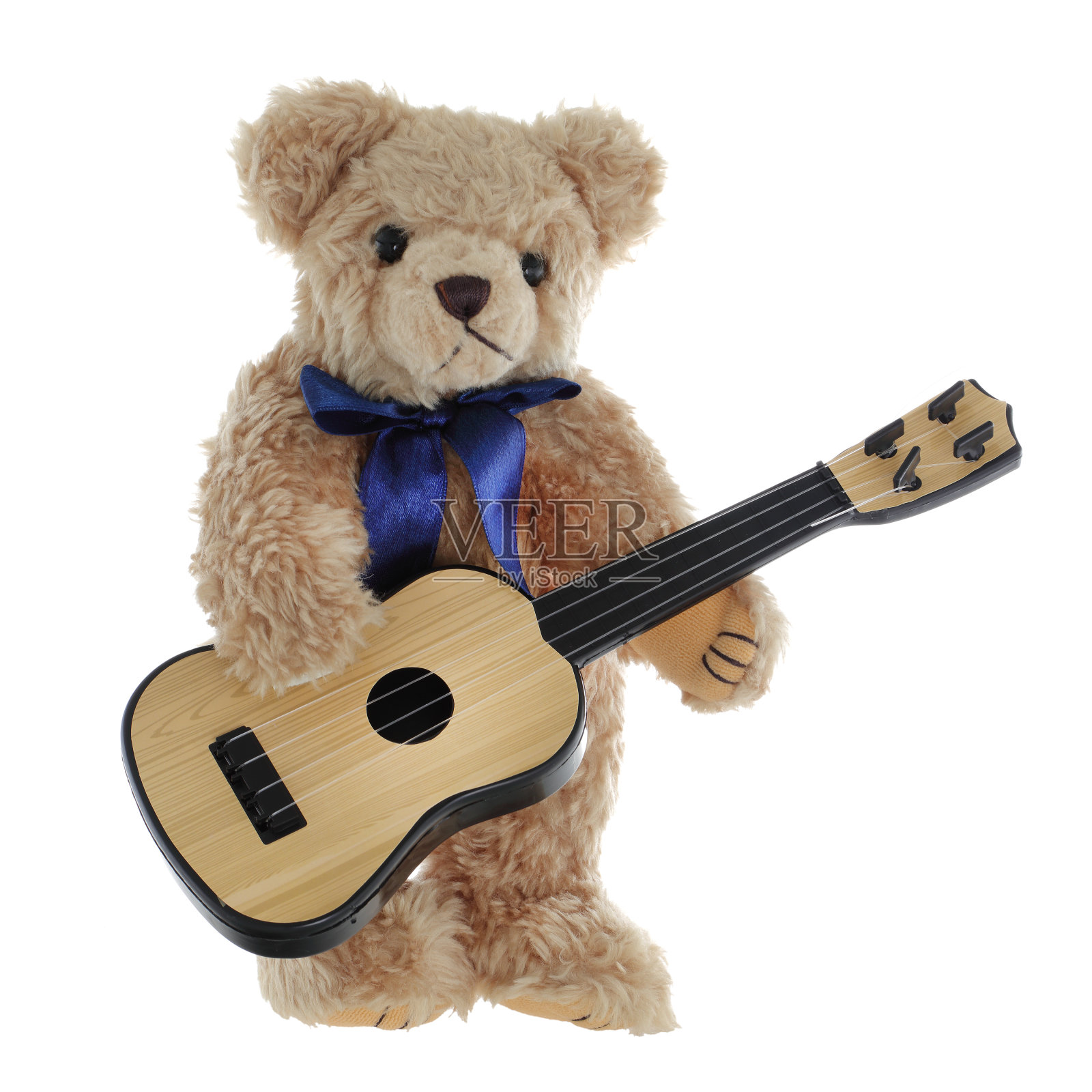 可爱的棕色泰迪熊弹吉他照片摄影图片