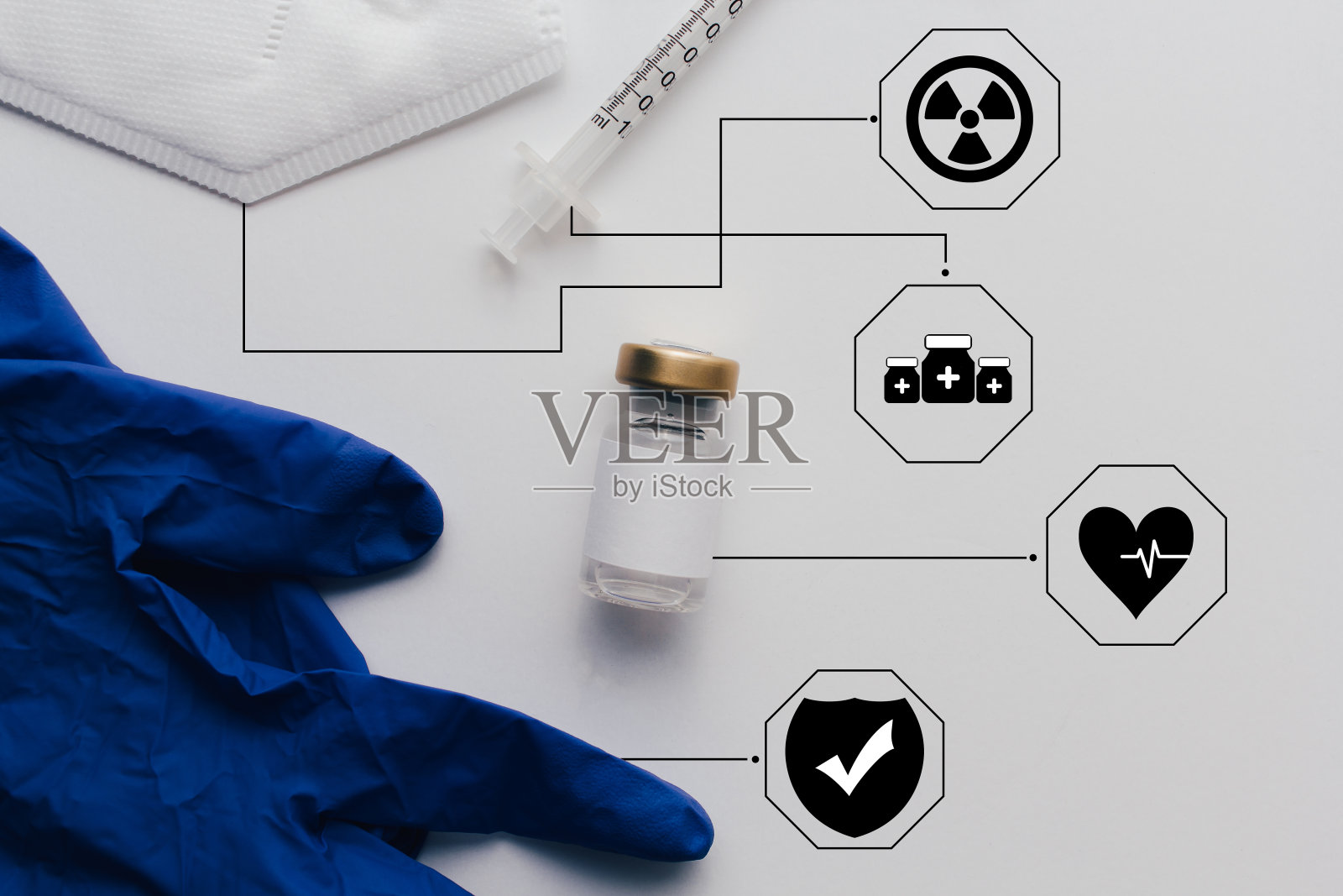 疫苗注射、药瓶、口罩、手套,具有未来感界面。照片摄影图片