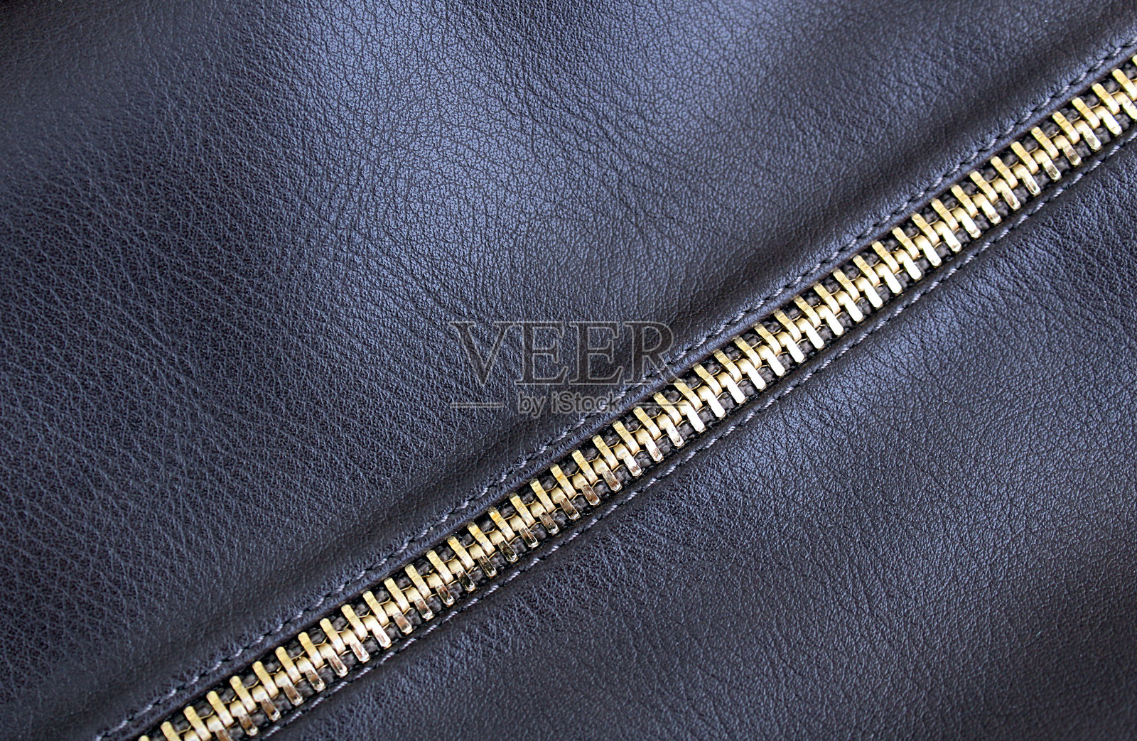 仿皮革与铁长拉链黑色照片摄影图片
