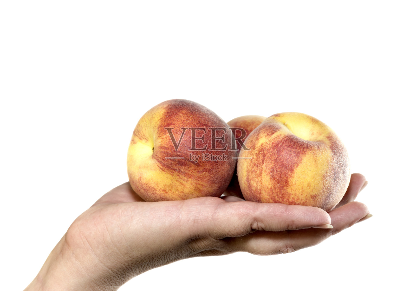 女人手捧桃照片摄影图片