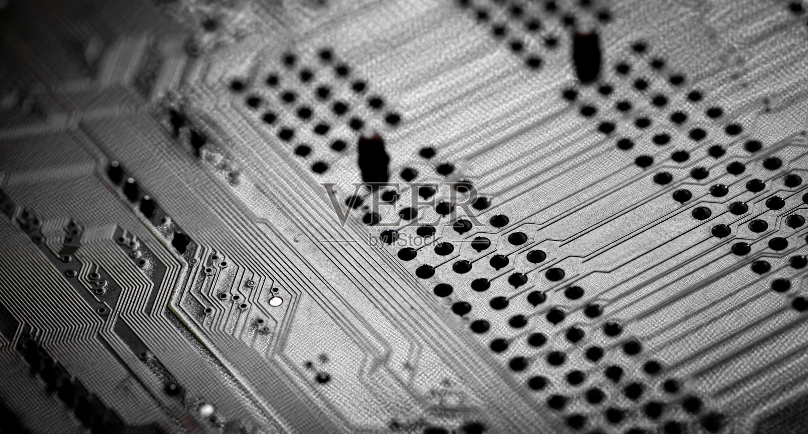 PC电路板上的印刷线路的宏观特写照片摄影图片