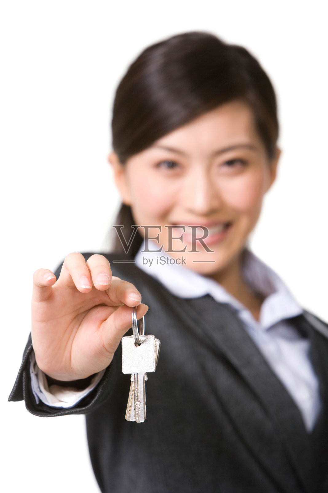 商务女士和钥匙照片摄影图片