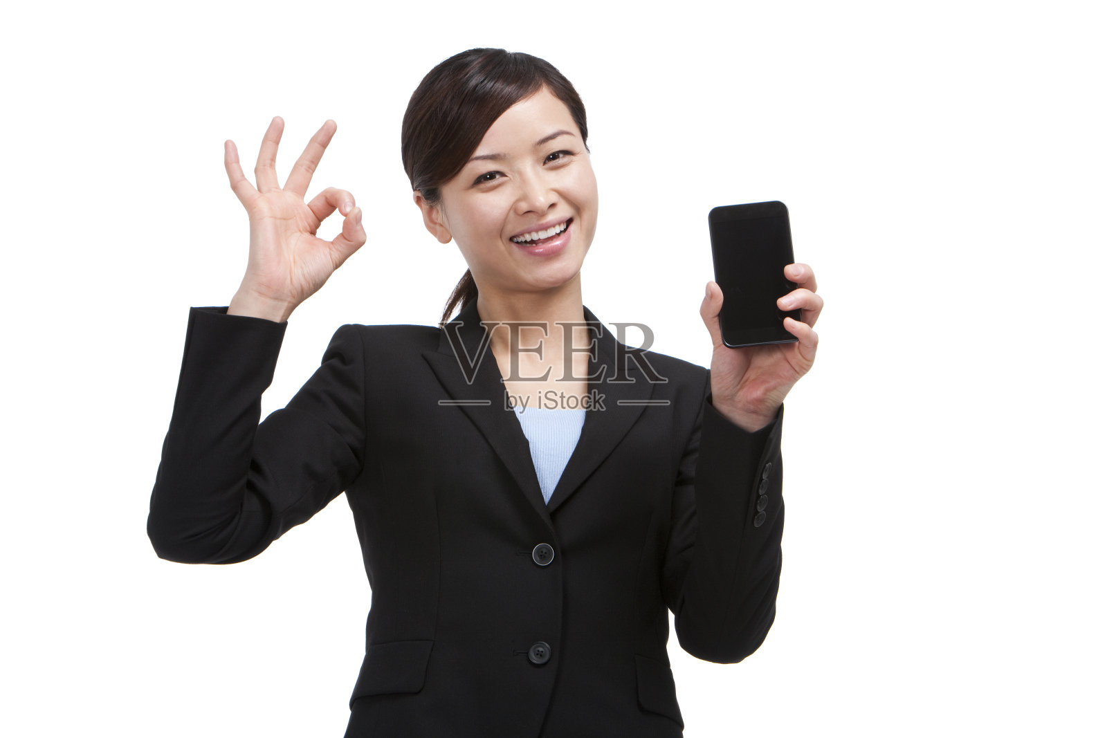 青年商务女士展示手机照片摄影图片