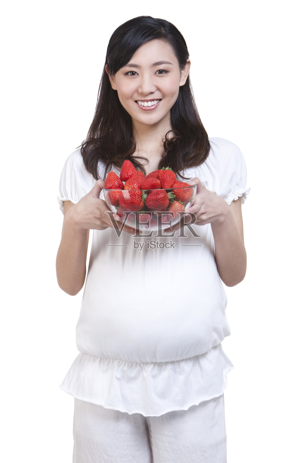 孕妇和新鲜草莓照片摄影图片