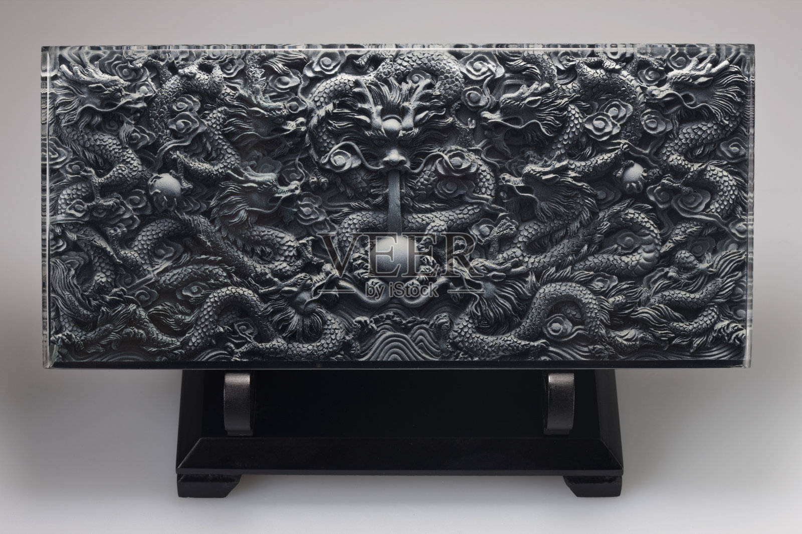 龙形图案砖雕照片摄影图片