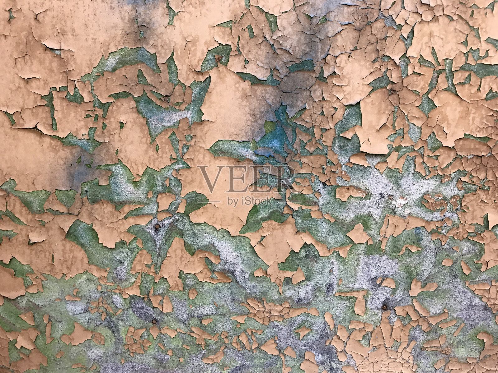 近距离的油漆剥落的墙壁照片摄影图片