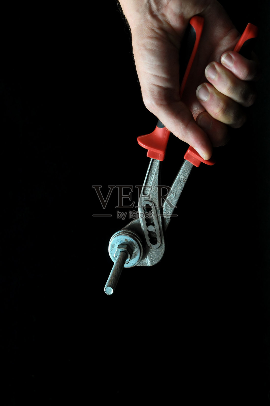 钳子和手照片摄影图片