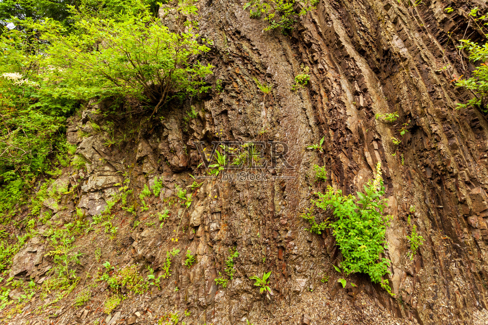 石头纹理-固体物质的结构性质和它的部分的位置。照片摄影图片
