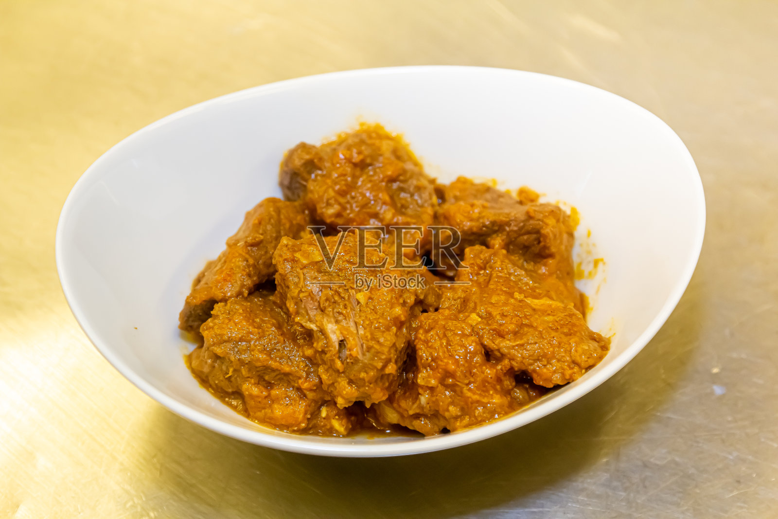 用红番茄酱炖的肉照片摄影图片