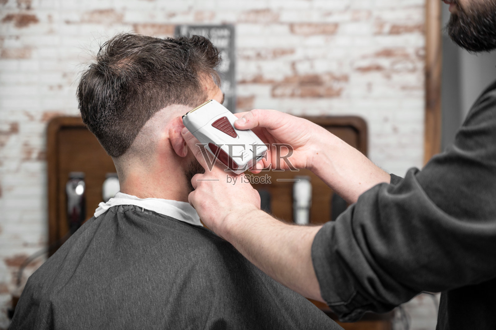 在理发店工作。高质量的照片照片摄影图片