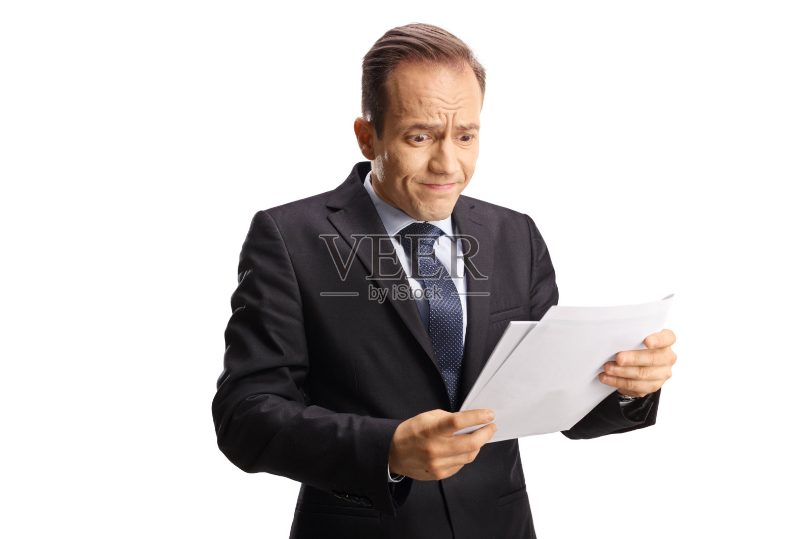 震惊的商人正在看一份文件照片摄影图片