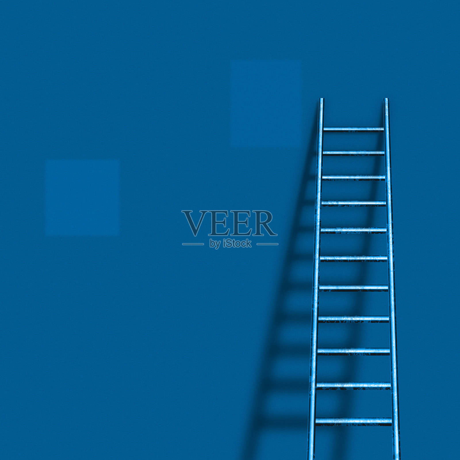 梯子靠在蓝色的墙上照片摄影图片