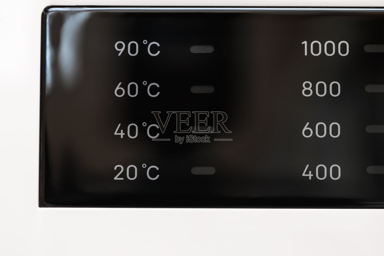 洗衣机显示器靠近。抽象洗衣编程背景照片摄影图片