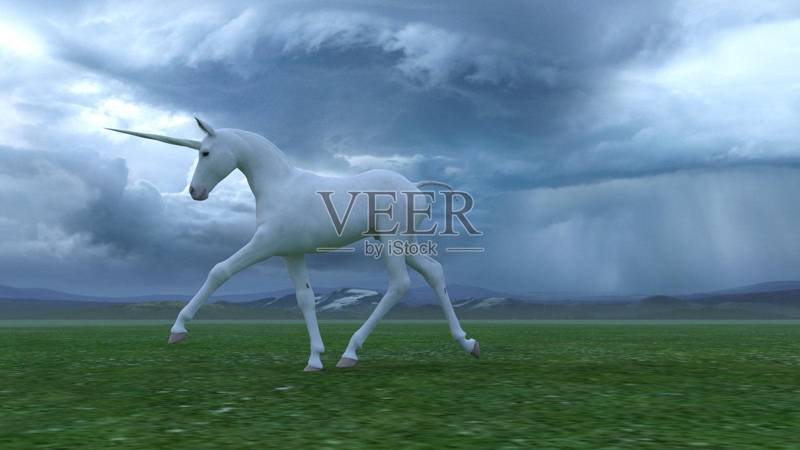 绿色田野里的独角兽照片摄影图片