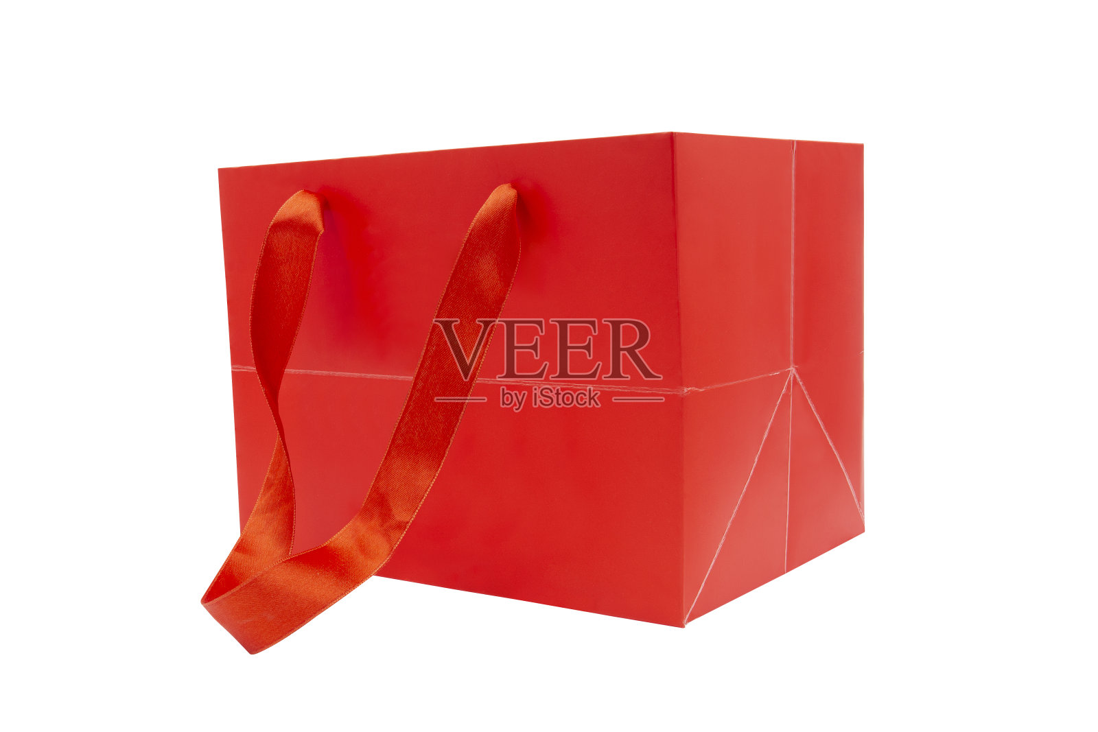 白色背景上的红色礼品袋照片摄影图片