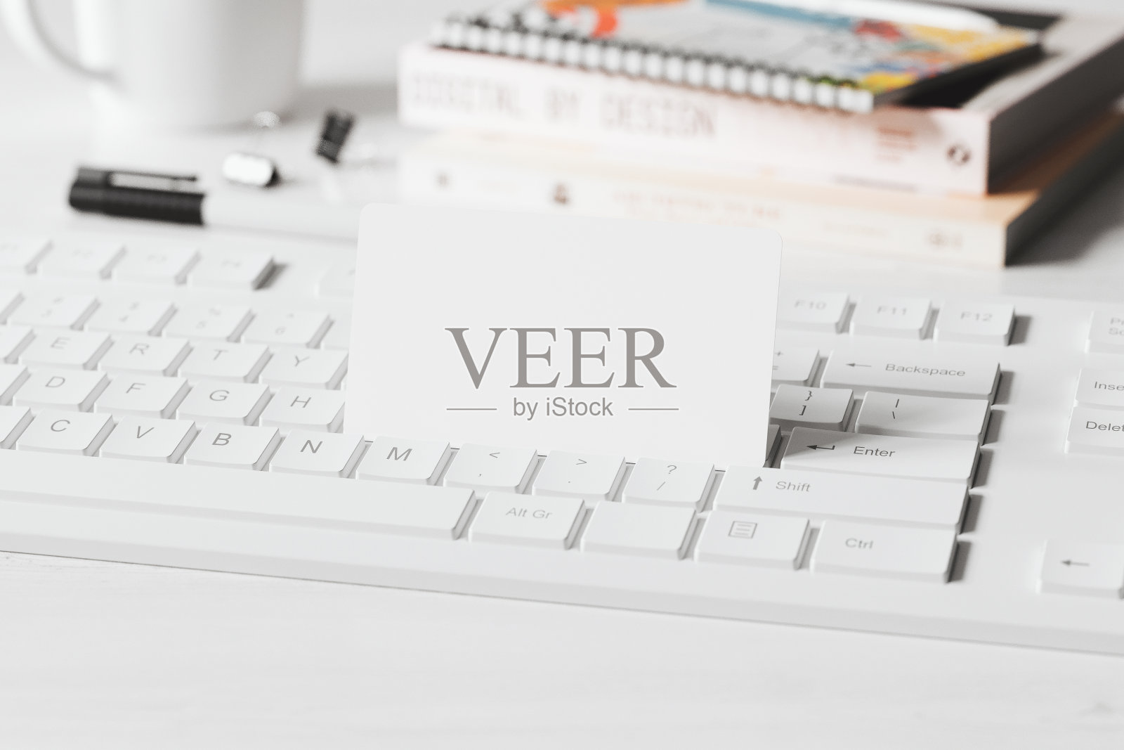 键盘上的名片模型照片摄影图片