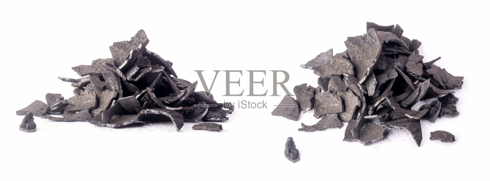 一堆椰子壳木炭照片摄影图片