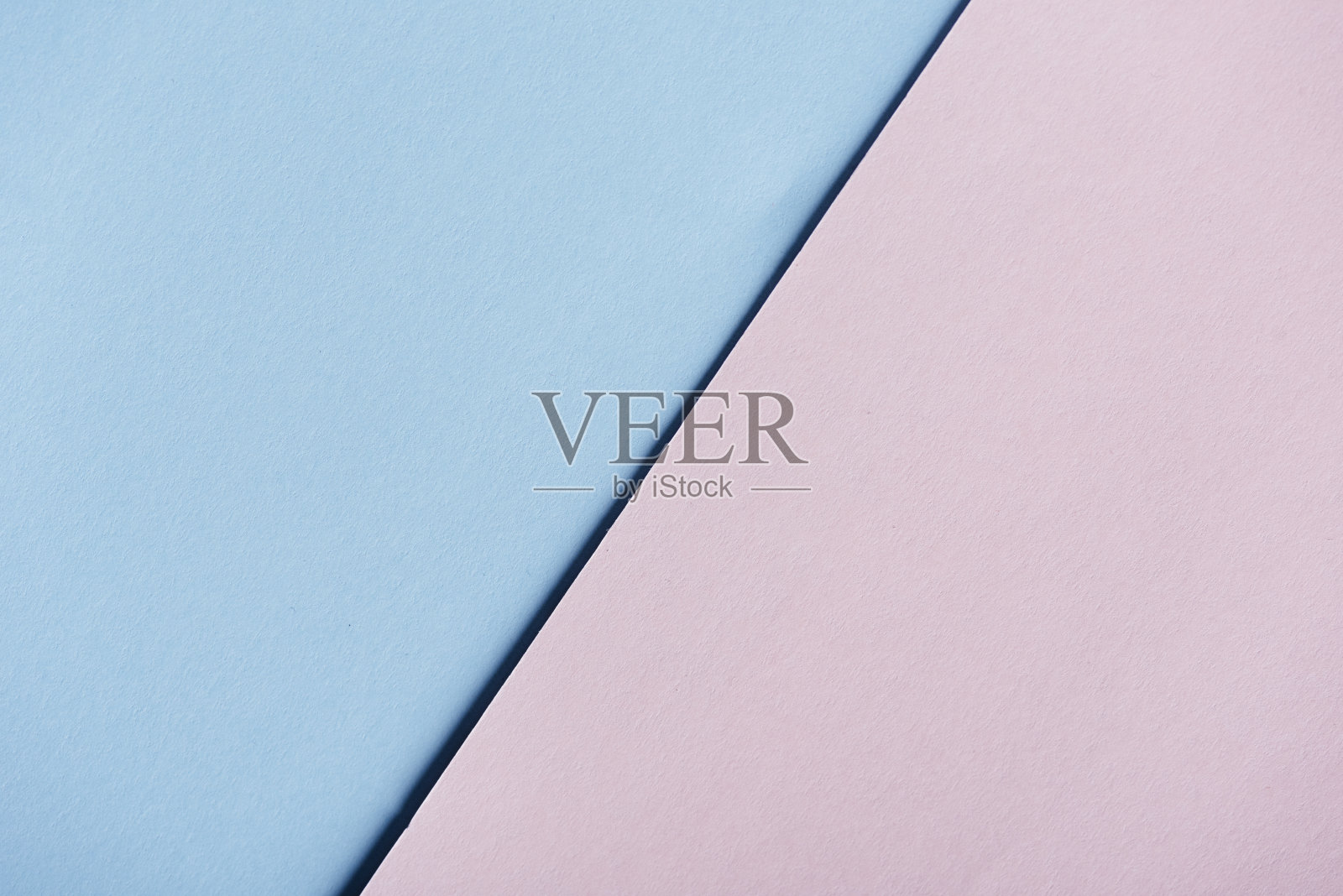 抽象蜡笔几何创意背景淡粉色和蓝色。照片摄影图片