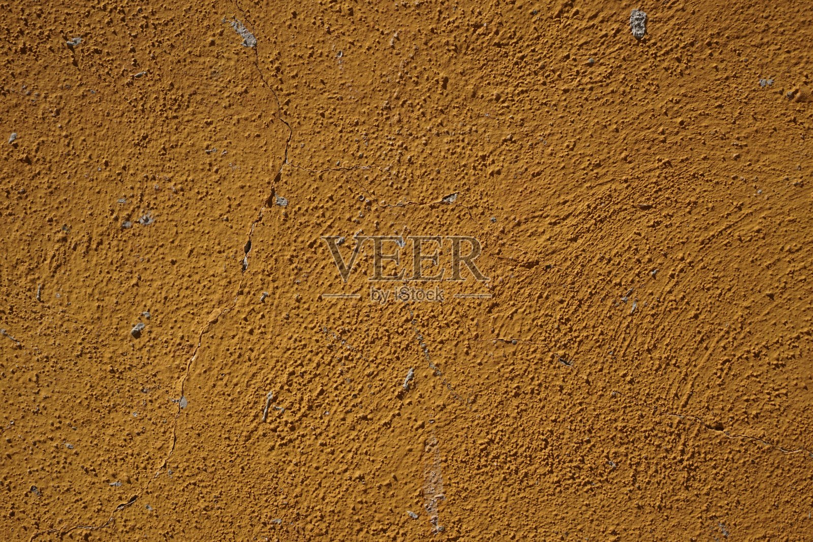 旧墙的细节由淡黄色的石膏制成照片摄影图片