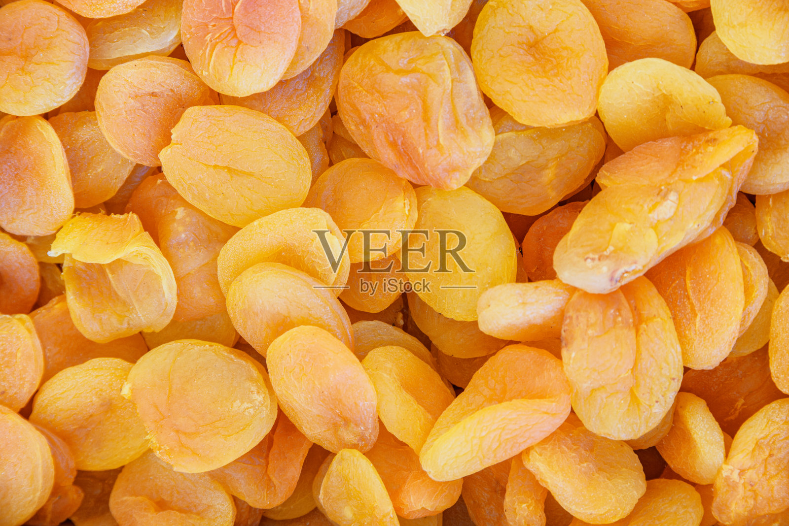 近距离观察杏干。橙色水果照片摄影图片