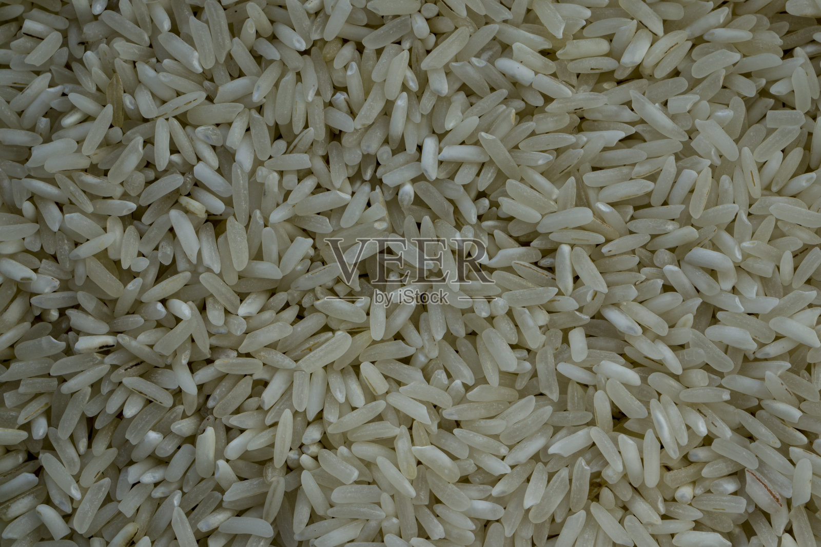 白色的米饭。白色米粒的纹理背景。照片摄影图片