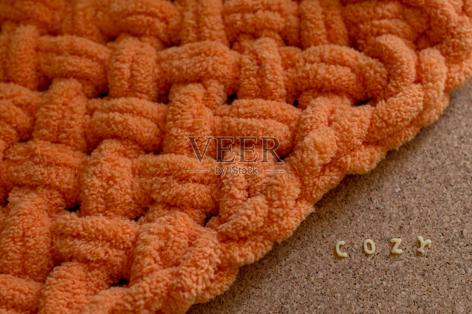 舒适的毛绒针织格纹在温暖的颜色照片摄影图片