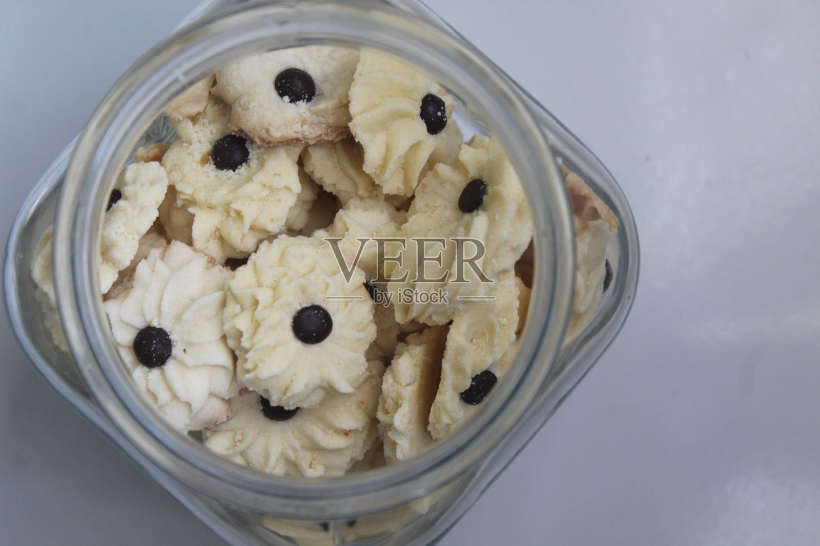 注射蛋糕在玻璃罐里照片摄影图片