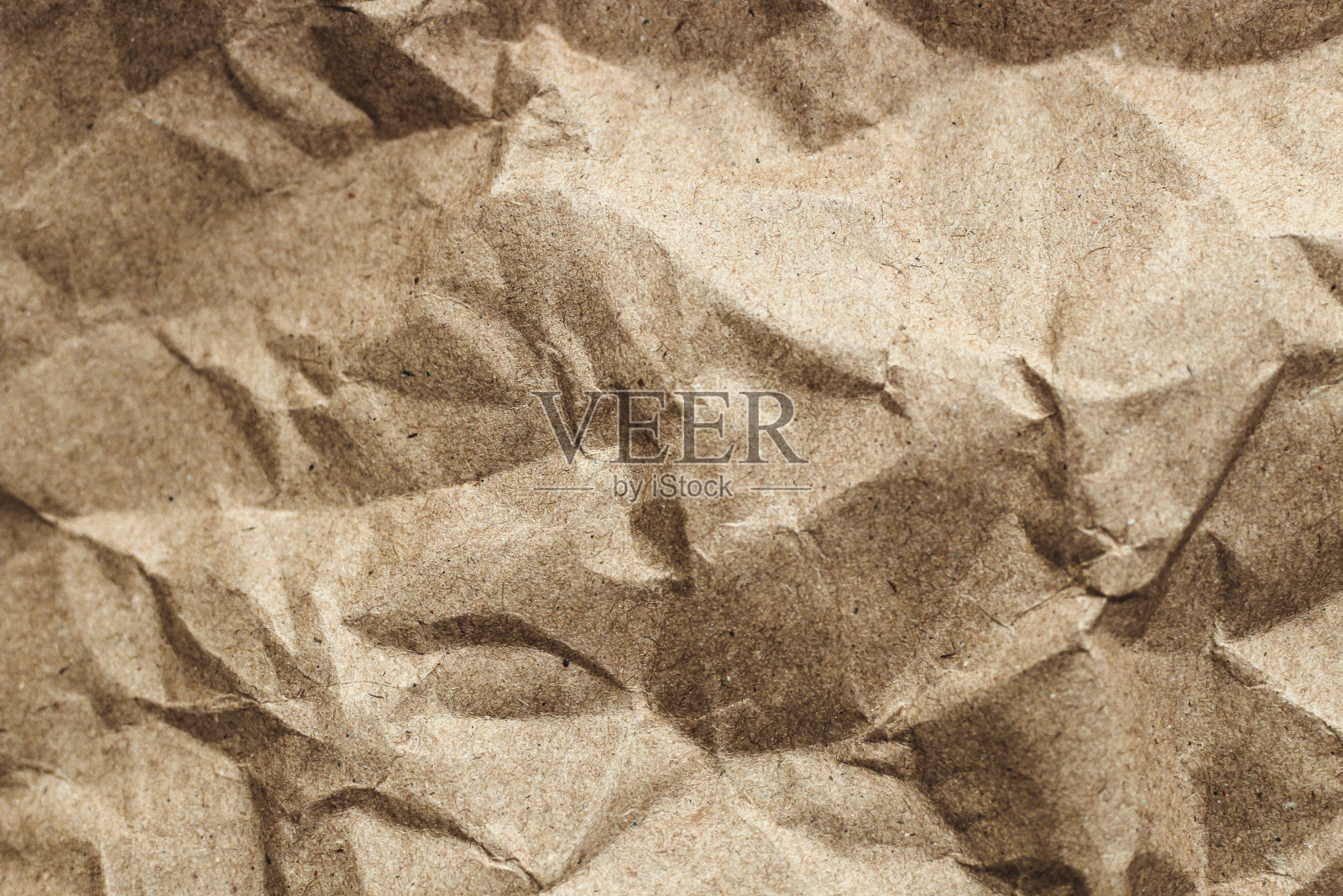 质地牛皮环保纸,回收利用。纸板表面的特写照片摄影图片