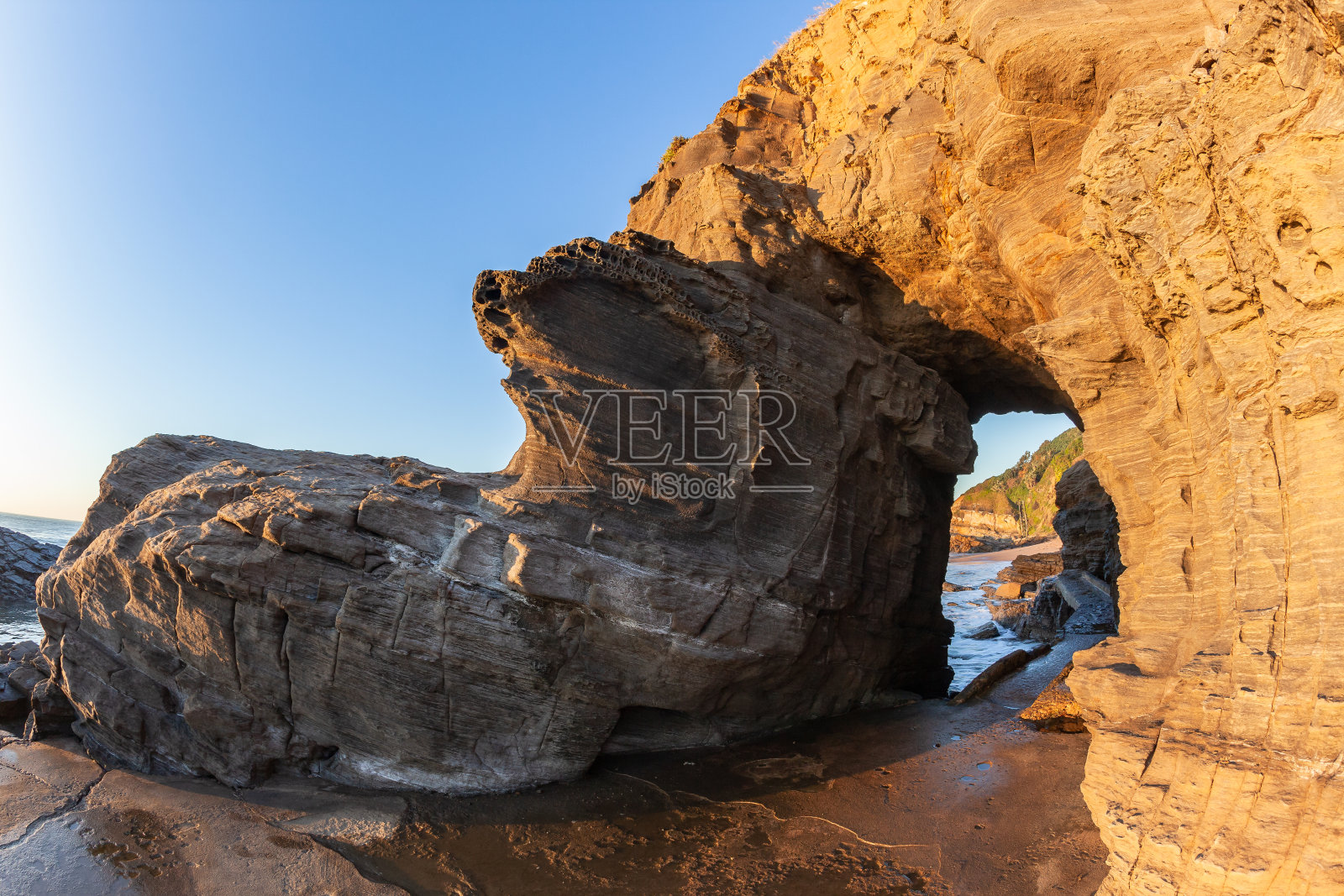 海滩海洋悬崖洞徒步路径照片摄影图片