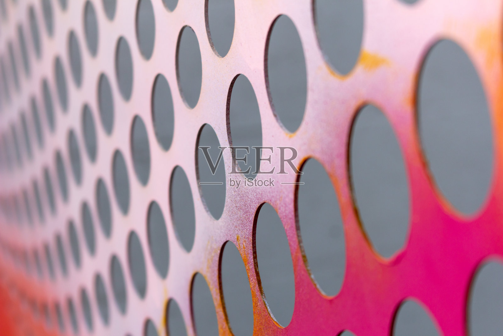 粉色的墙孔照片摄影图片