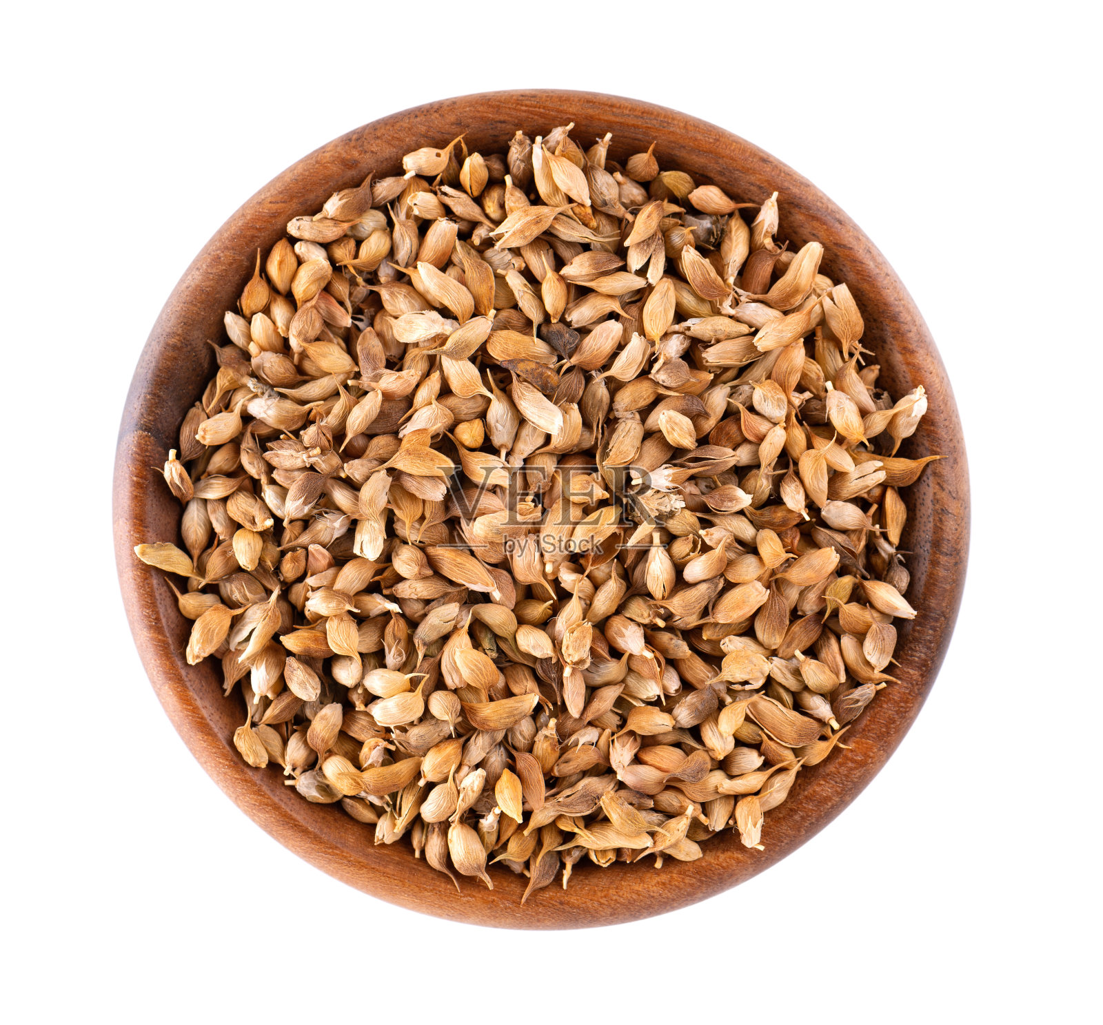 木碗里的乌松种子,在白色背景上分离。葫芦巴或蓝葫芦巴。前视图。照片摄影图片