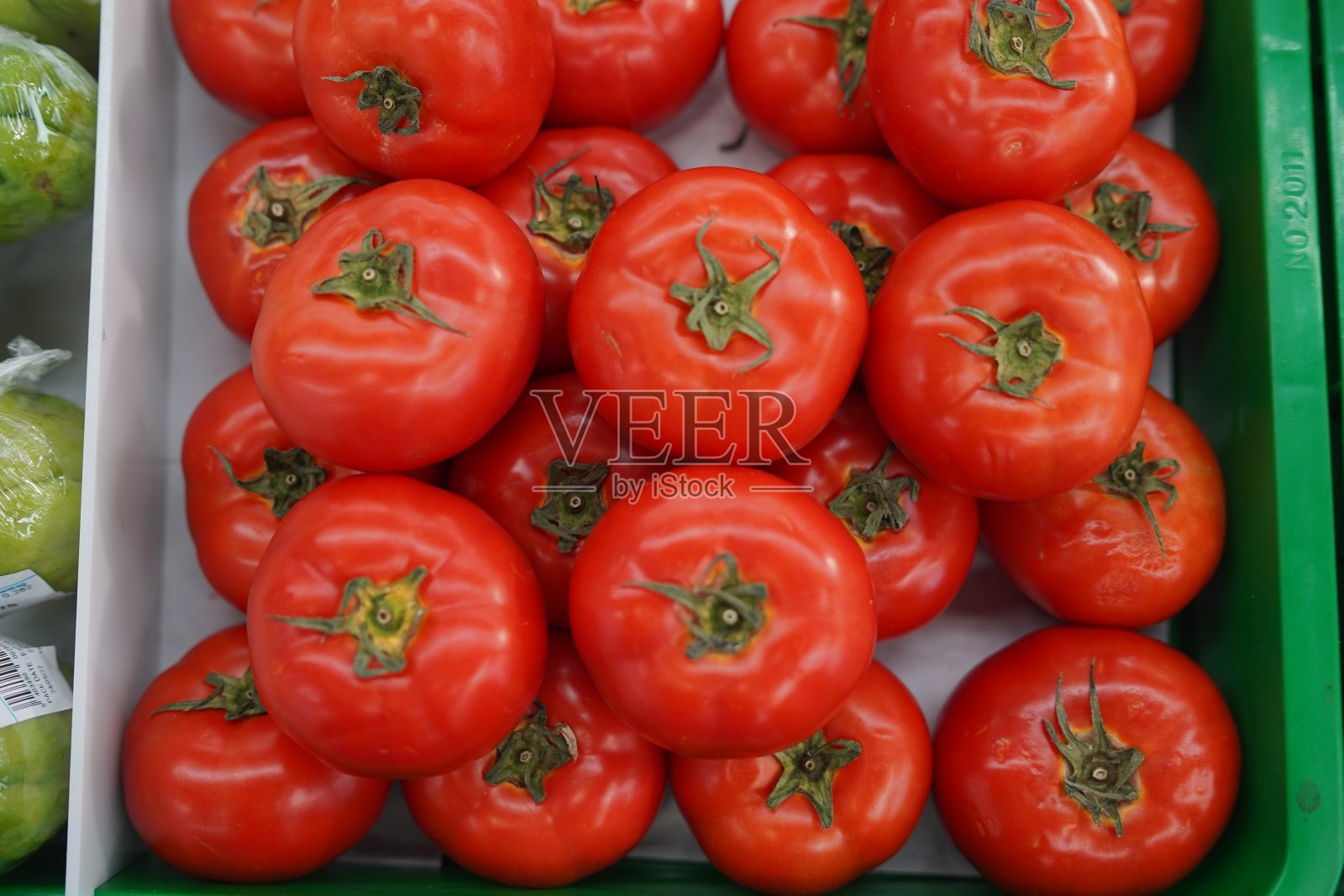 红番茄的背景。一堆西红柿照片摄影图片