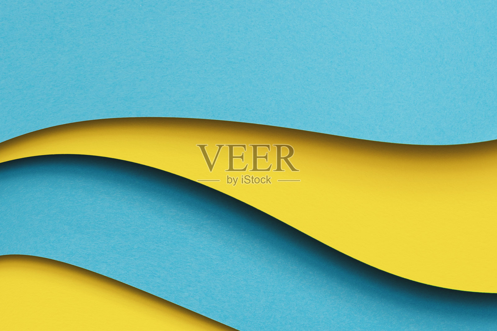 摘要彩色纸几何平铺组成背景。波浪形的蓝色,黄色的颜色线条背景。俯视图,复制空间照片摄影图片