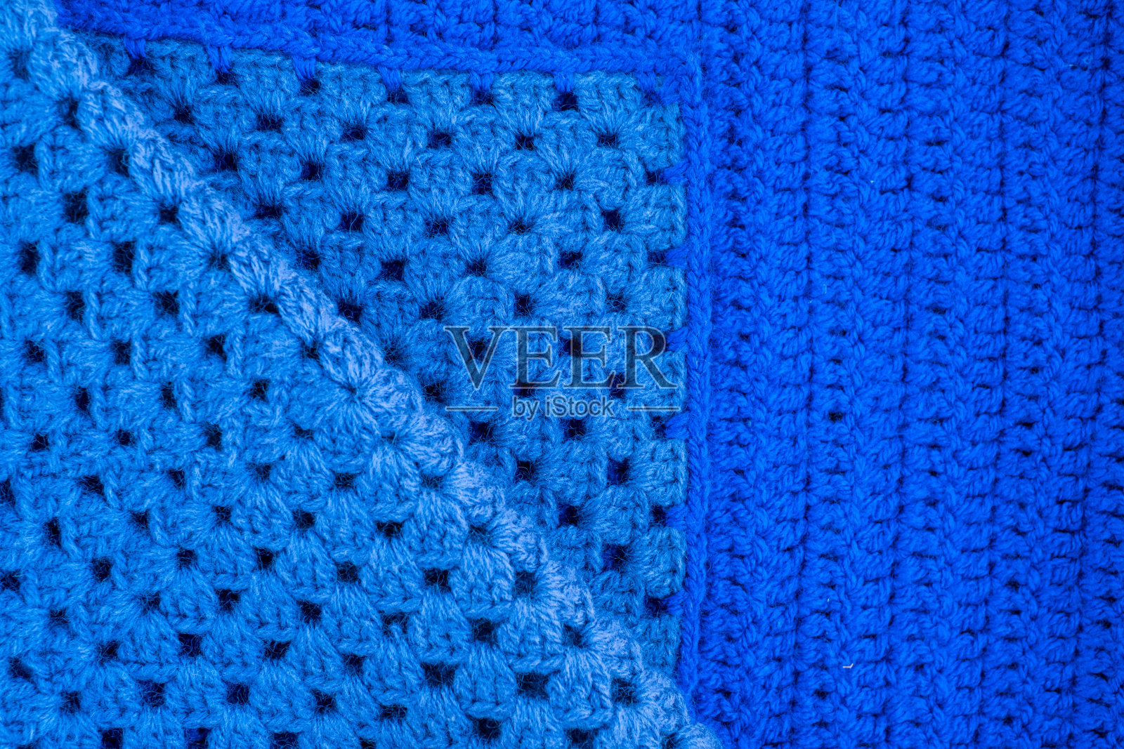 手工编织的蓝色羊毛格子照片摄影图片