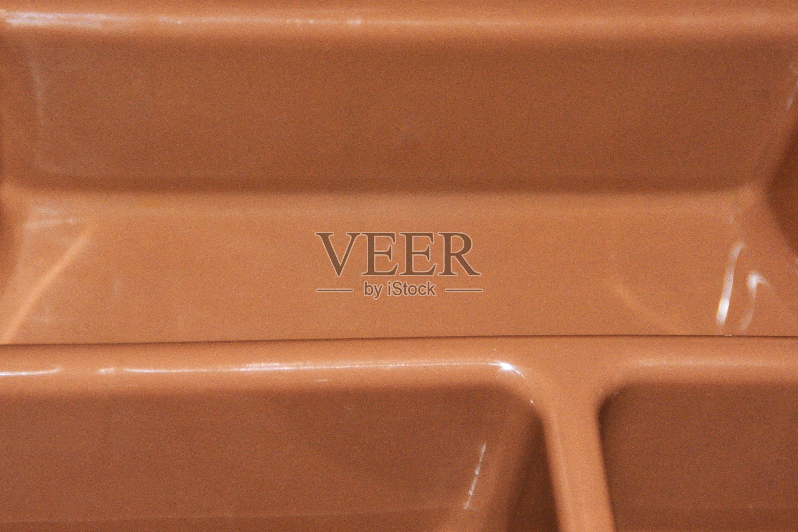 棕色的塑料托盘照片摄影图片