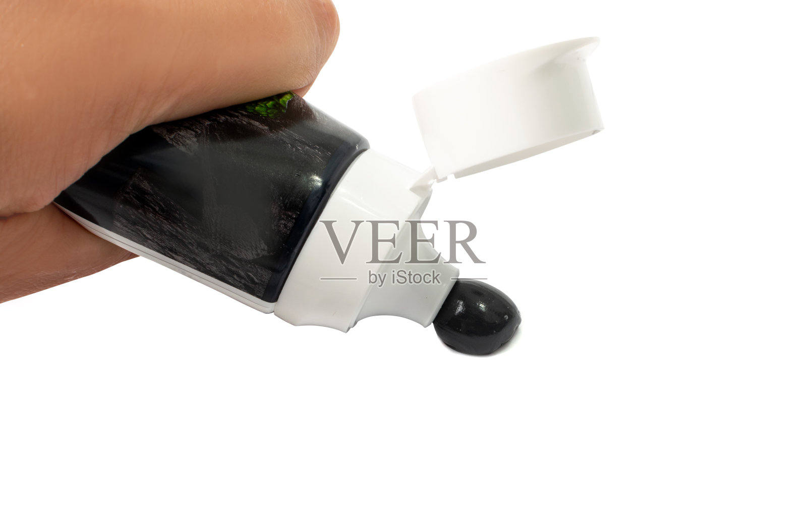 黑煤牙膏照片摄影图片