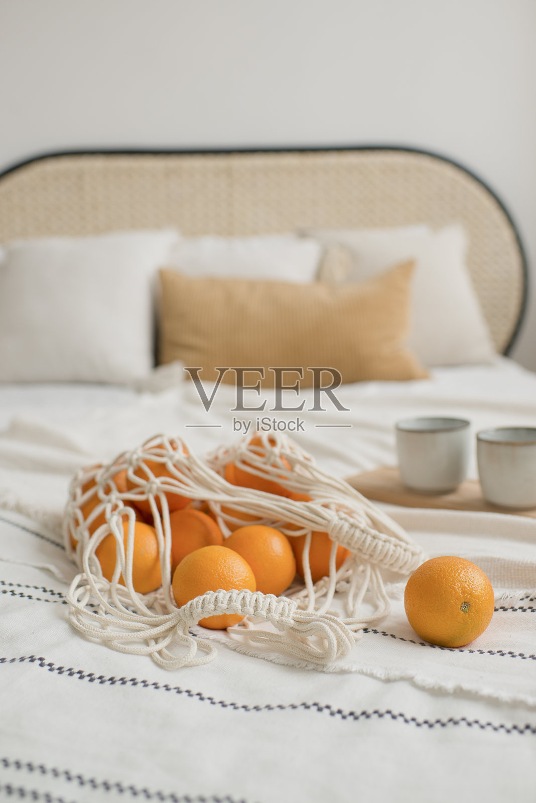 橘子装在绳袋里照片摄影图片