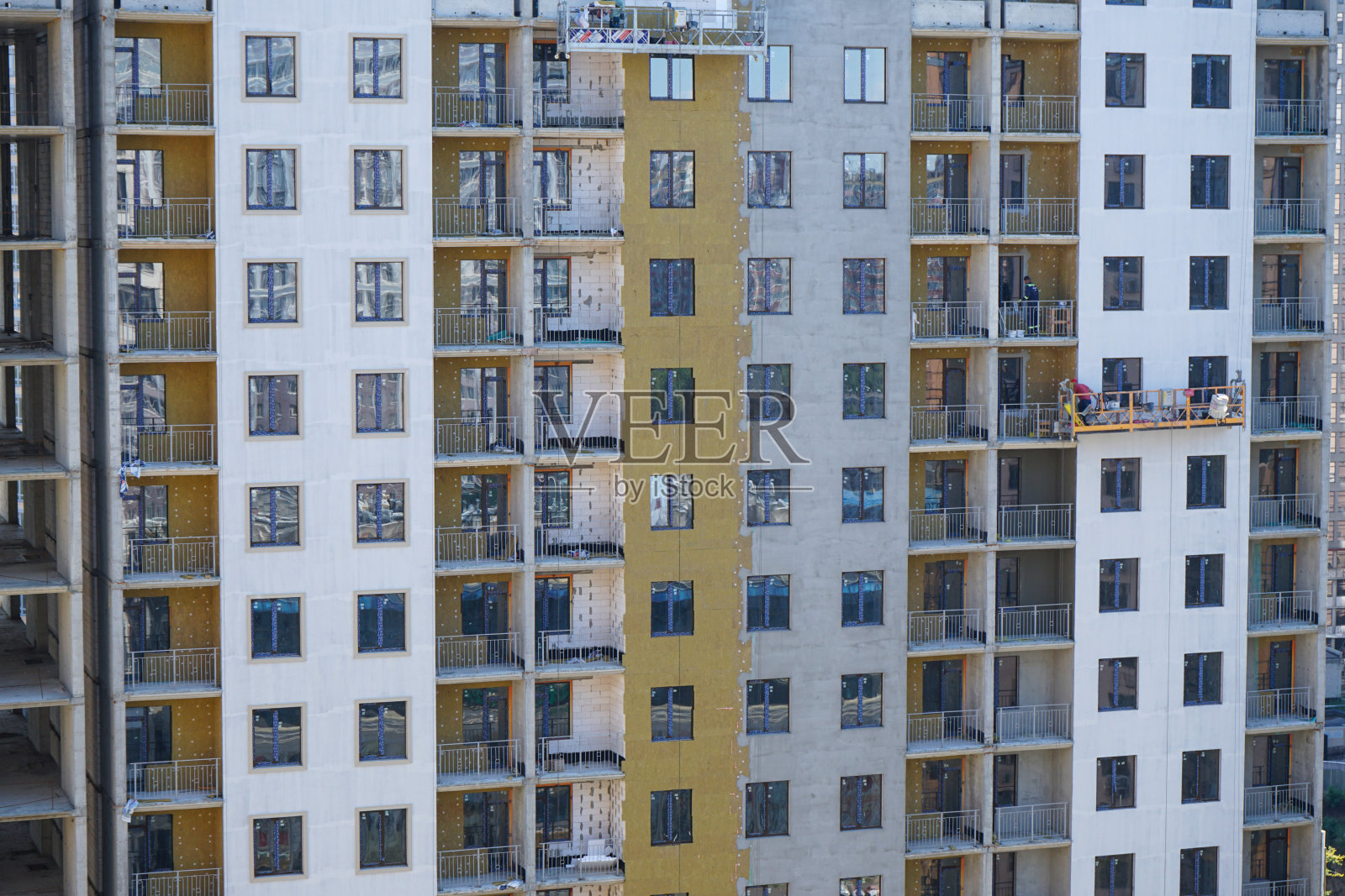 多层建筑物外墙保温工程及保温工程。照片摄影图片