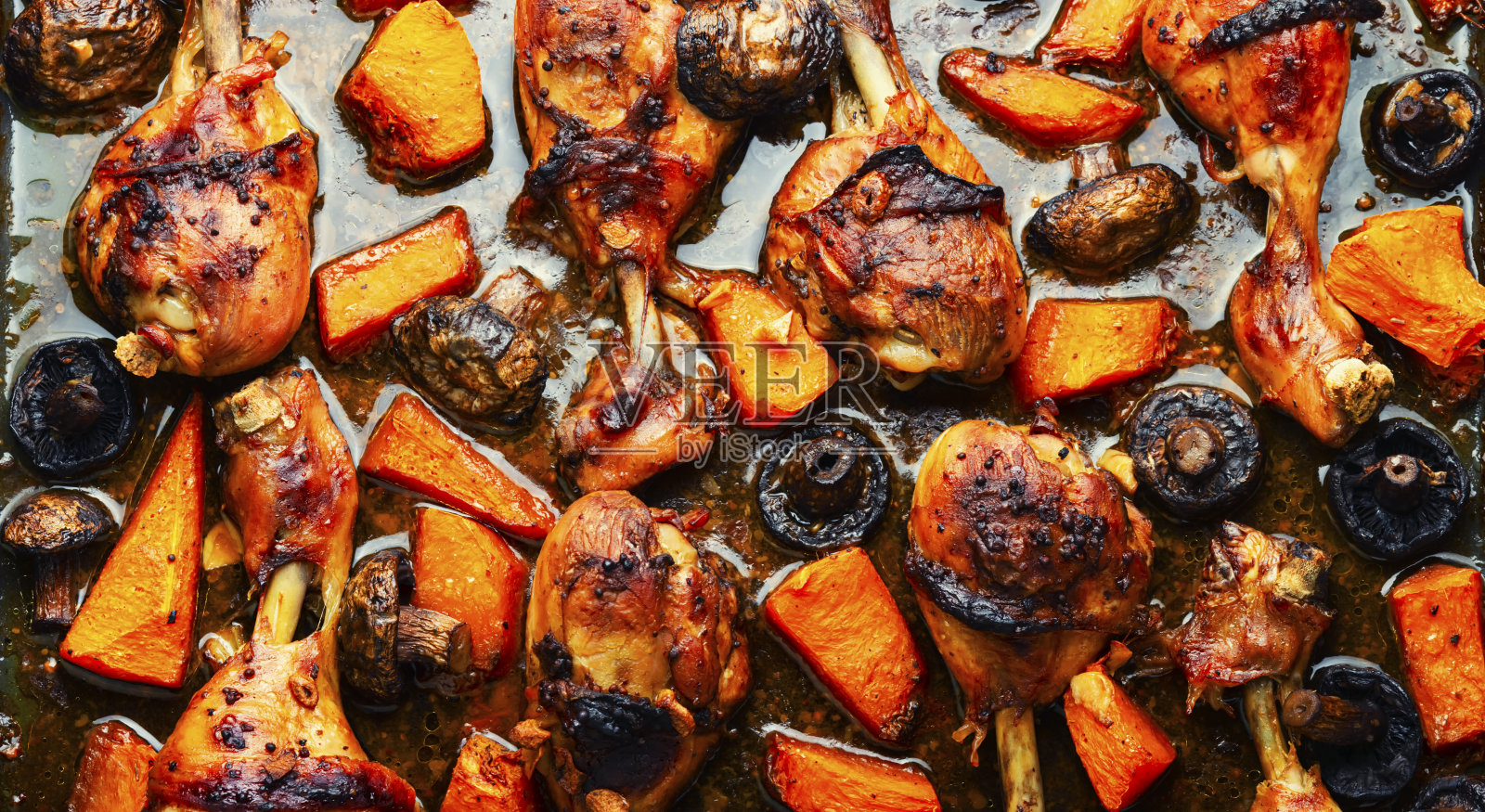 烤鸡腿配南瓜照片摄影图片