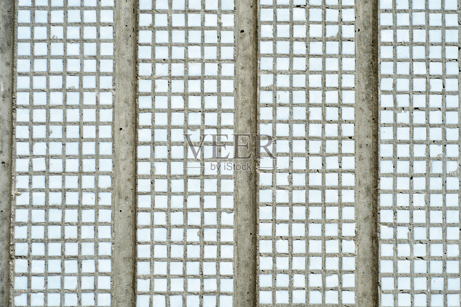 背景墙的小方砖。照片摄影图片