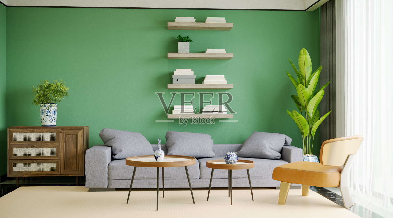 时尚的客厅内饰有沙发和绿色的墙照片摄影图片