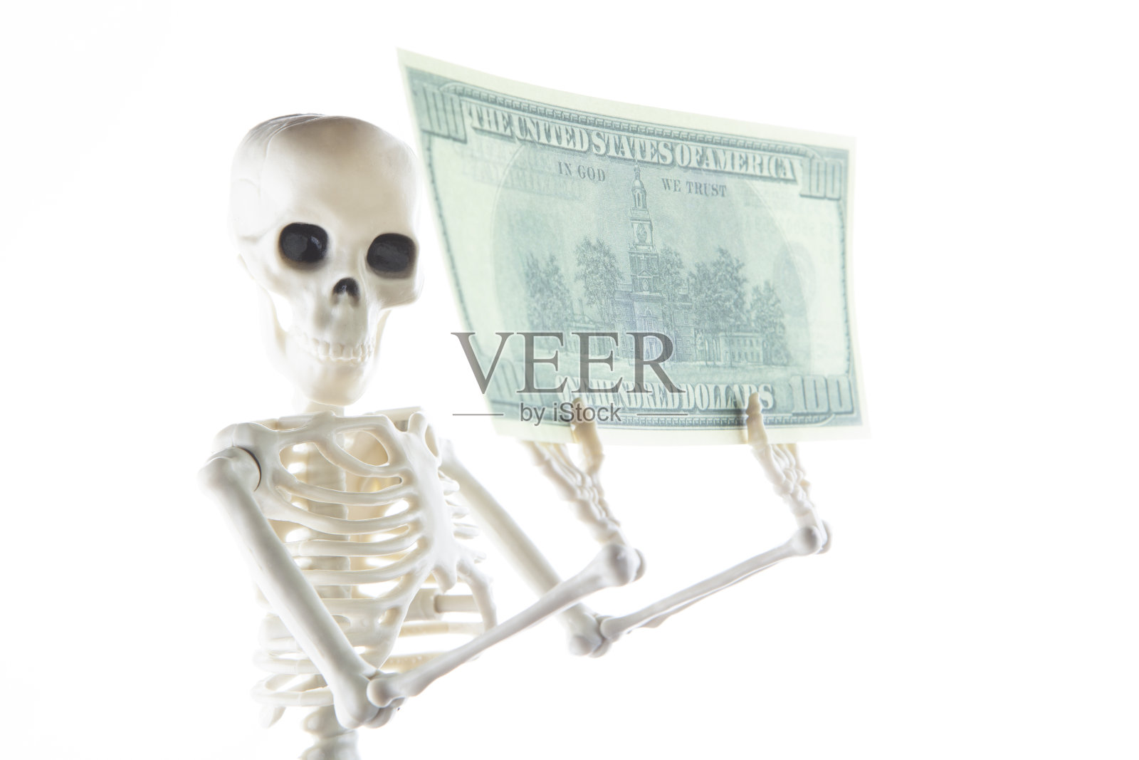 图像的骨架钱纸币的白色背景照片摄影图片