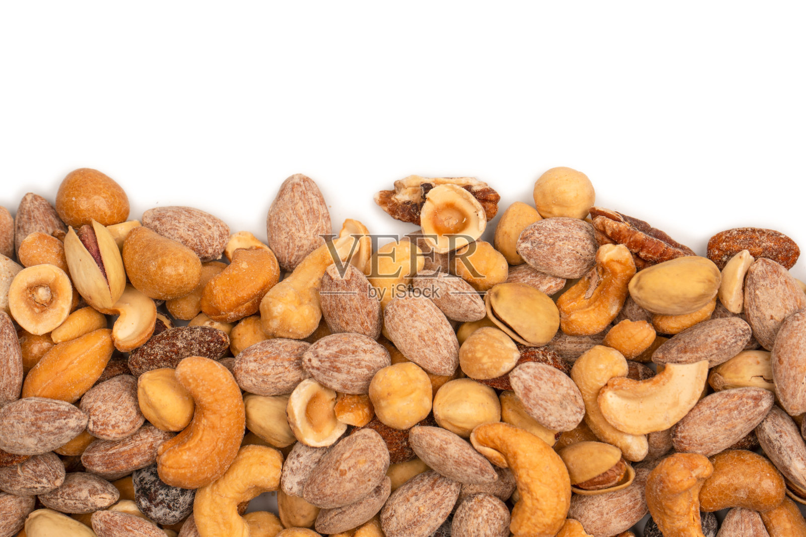 一组杏仁,开心果,核桃,夏威夷果,腰果。照片摄影图片